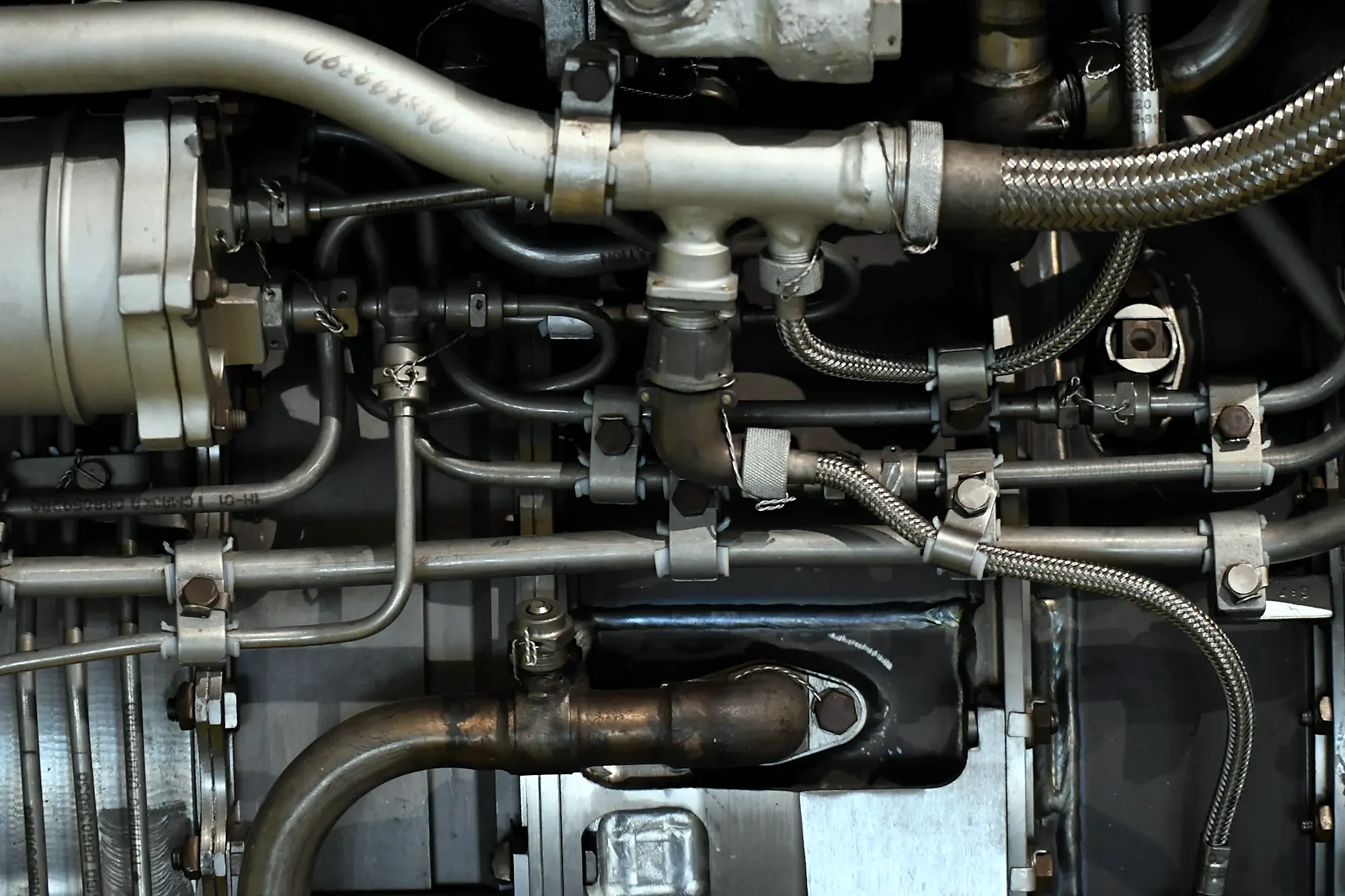 Machinery with hydraulic pipes and wiring